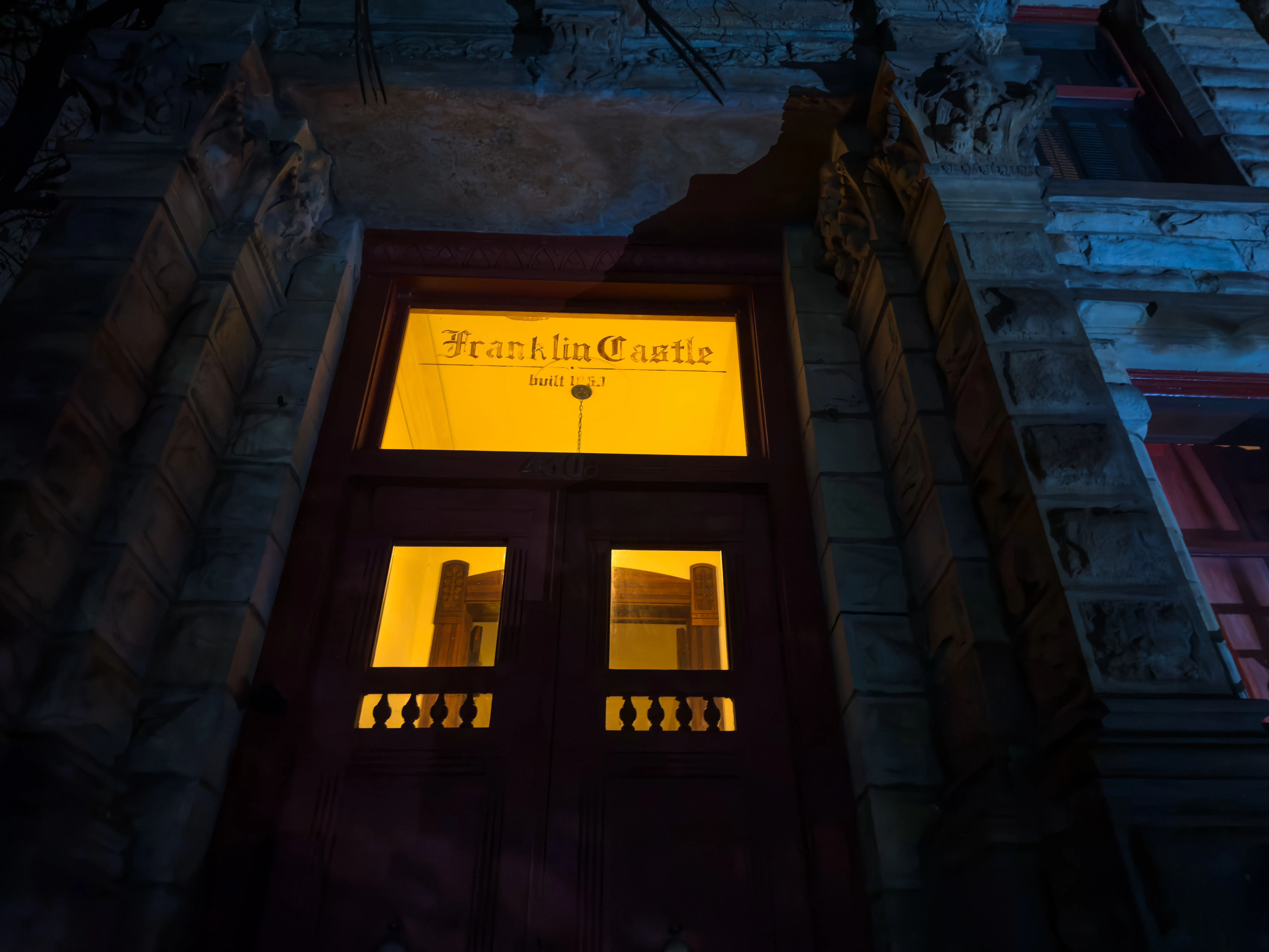 a door with a lit up window