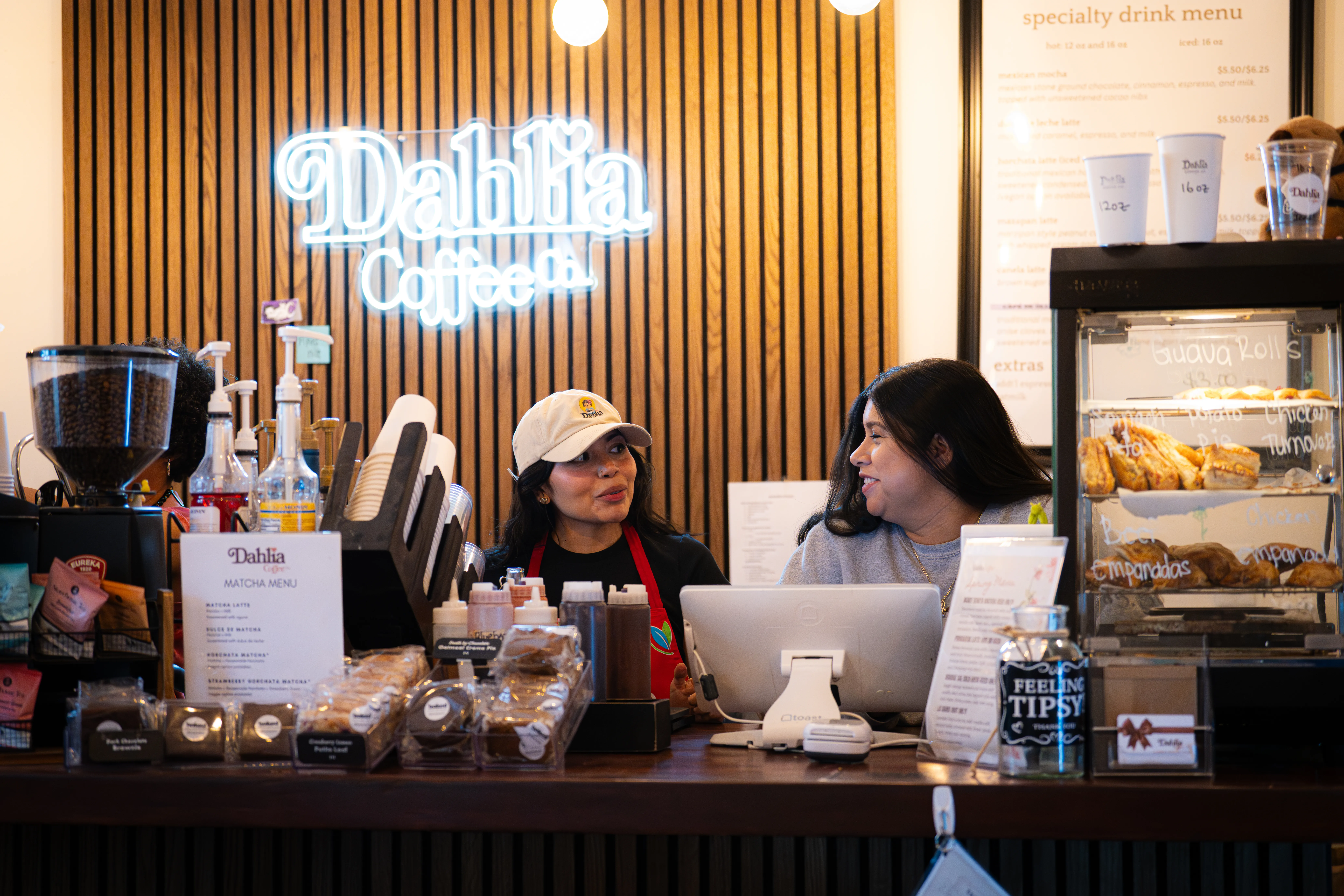 a couple of women at a counter