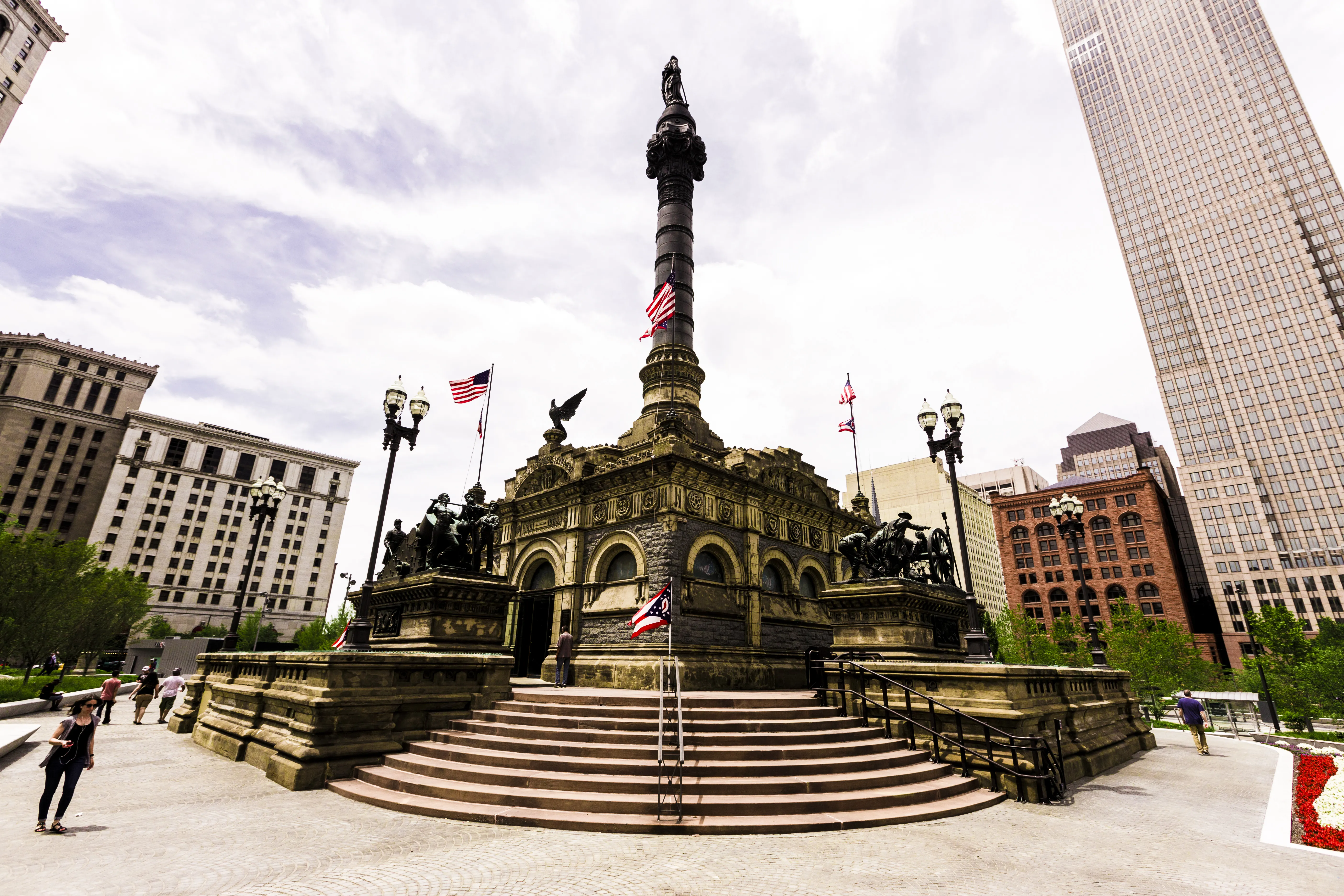 a monument with a flag on top