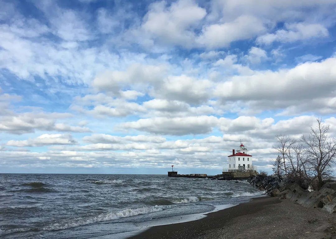 a lighthouse on a beach