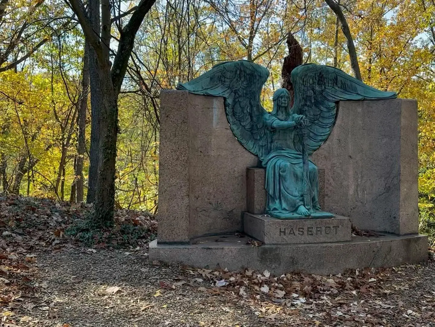 a statue of a person with wings